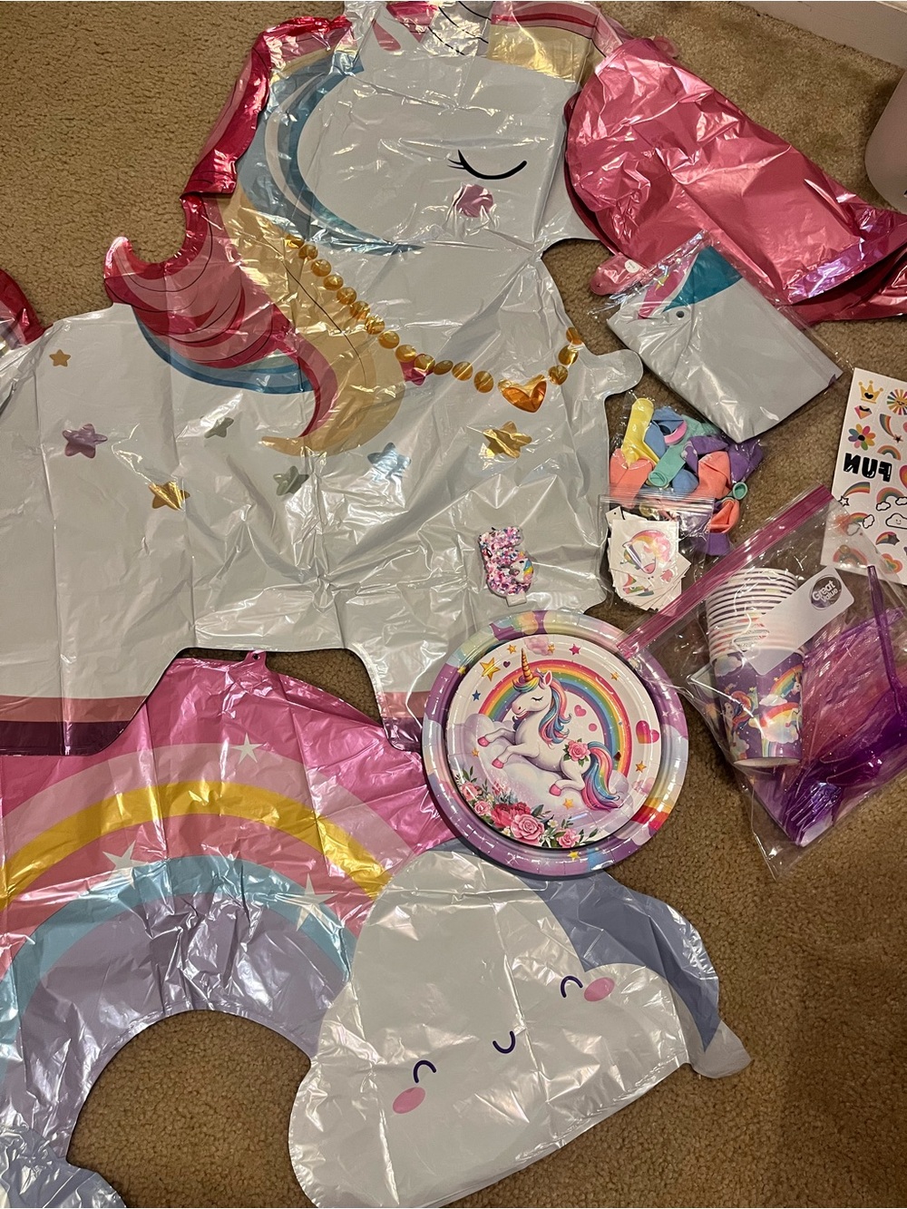 Pastel rainbow unicorn birthday party supplies balloons